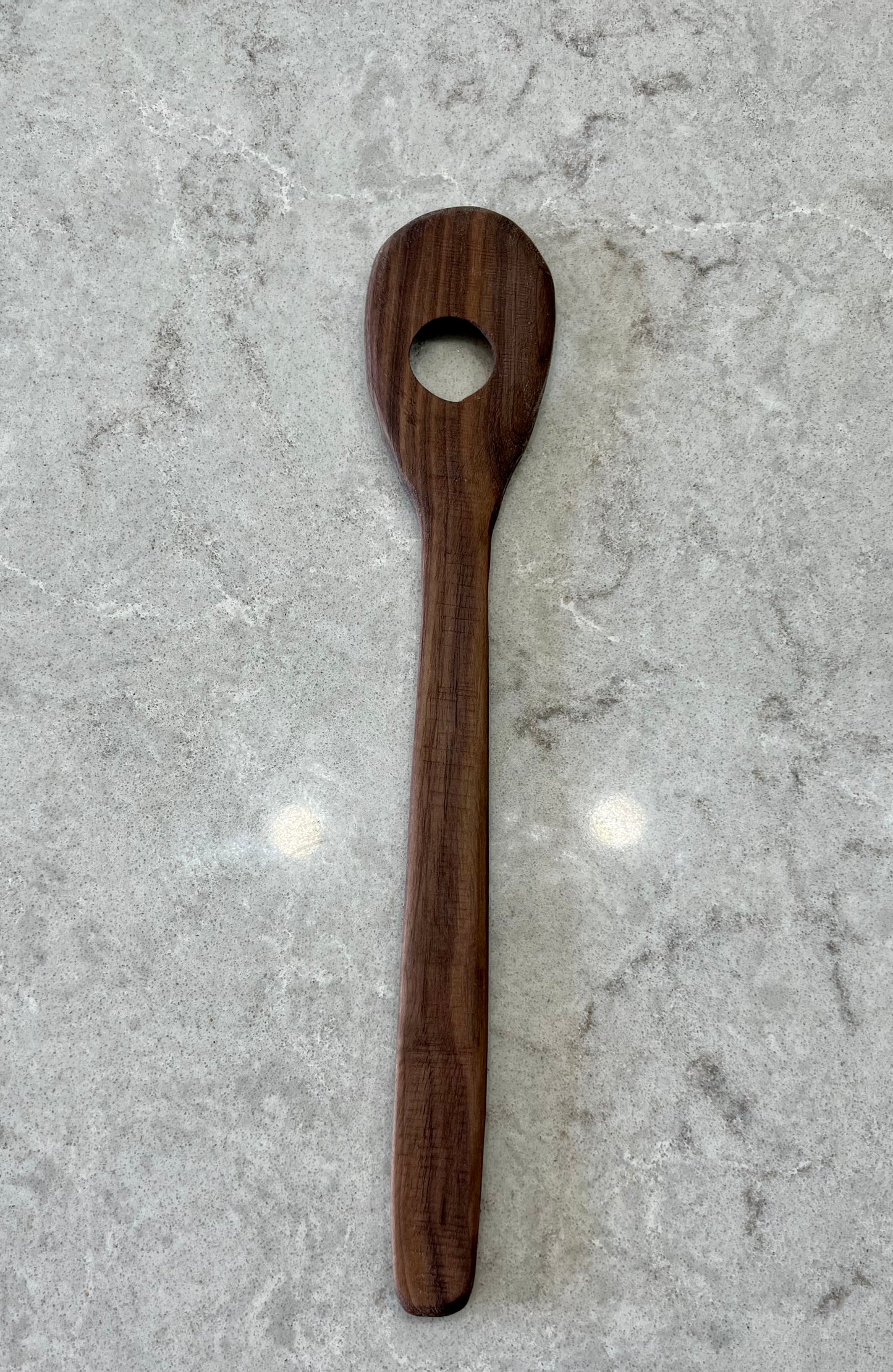 Walnut spoon with hole